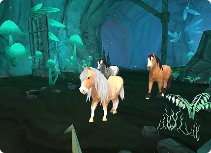 Scène de jeu de simulation équestre à l'intérieur d'une grotte mystique illuminée avec plusieurs chevaux, présentant des éléments fantastiques et un environnement propice à l'aventure.